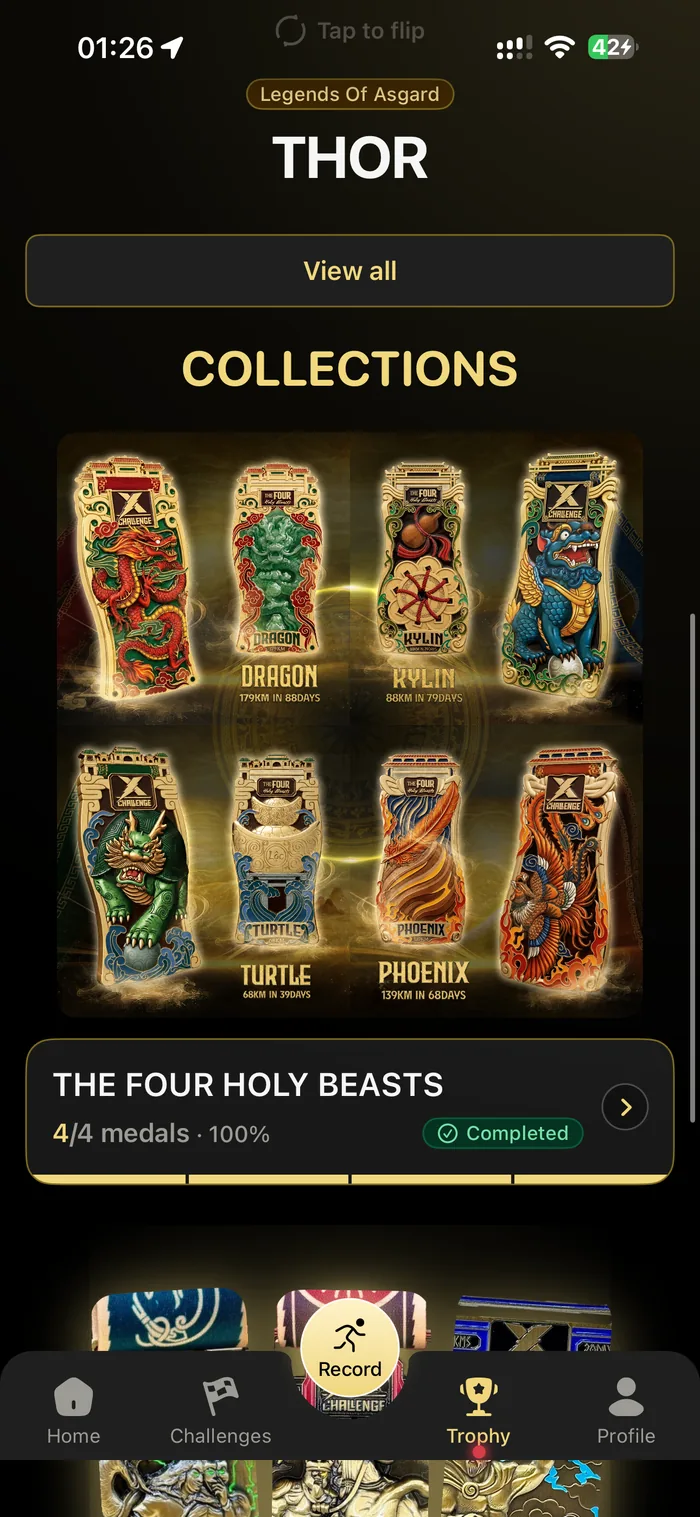 The Trophy tab showing the Four Holy Beasts collection complete at four of four medals