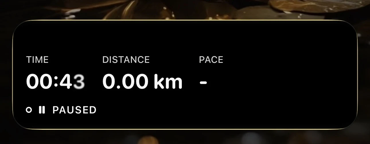 The X Challenge Live Activity on an iPhone lock screen, showing time, distance and pace
